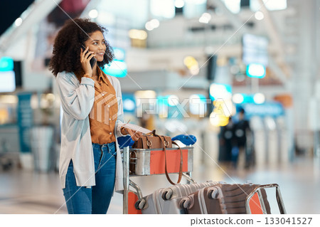 Phone call, travel and happy black woman in airport with trolley, luggage and suitcase for global trip. Vacation, communication and girl on smartphone for schedule, talking and flight details 133041527