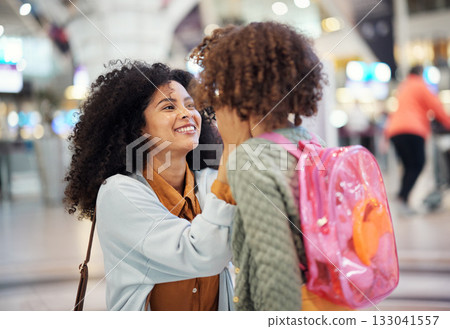 Black woman, girl child and reunion in airport with excited face, love touch and greeting. Family, mother and daughter for welcome, embrace or happy for global travel, transportation or immigration Black woman, girl child and reunion in airport with excited face, love touch and greeting. Family, mother and daughter for welcome, embrace or happy for global travel, transportation or immigration 133041557
