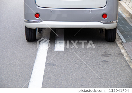 Cars parked on the side of the road 133041704