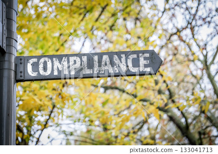 Compliance. Metal sign, arrow pointing direction symbolizing regulation, policy and ethical business 133041713