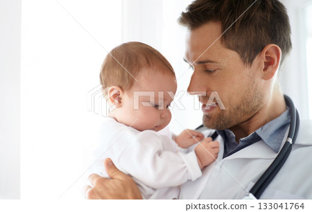 Man, pediatrician and holding baby for healthcare assessment, wellness consulting and service for children. Kids, medical doctor and newborn in clinic, hospital and expert consultation for pediatrics 133041764