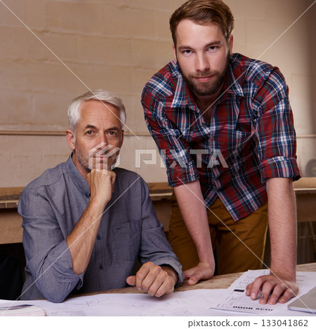 Architecture, teamwork and portrait of men in workshop with blueprint for building construction. Senior engineer, serious father and son working on design, project and plan of apprentice and mentor. 133041862