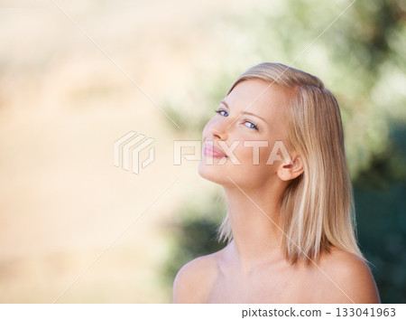 Woman, natural beauty and portrait of healthy skincare treatment on outdoor blurred background. Girl, happy and content after spa, facial care or minimal makeup, fresh skin glow and summer bokeh 133041963