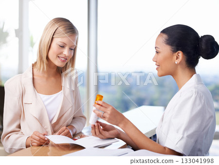 Spa receptionist, woman and product for beauty, wellness or cosmetics with offer, paperwork and benefit. Women, discussion and documents for health, cosmetic and smile together at salon help desk Spa receptionist, woman and product for beauty, wellness or cosmetics with offer, paperwork and benefit. Women, discussion and documents for health, cosmetic and smile together at salon help desk 133041998