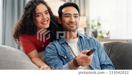 Man, woman and watching tv on sofa with remote, click and choice for movies, streaming or series in home. Happy couple, relax and television with care, bonding and love for film subscription at house Man, woman and watching tv on sofa with remote, click and choice for movies, streaming or series in home. Happy couple, relax and television with care, bonding and love for film subscription at house 133042022