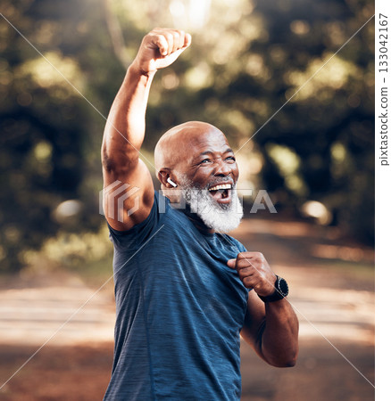 Park, success and running, winning black man excited and celebration at fitness run in nature with earphones. Music, workout and mature runner with smile and happy to celebrate exercise achievement. 133042167