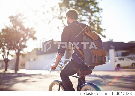 Bicycle, transport and man cycling in road with lens flare for exercise, commute and riding in morning. Travel, city and male cyclist on bike for eco friendly traveling, carbon neutral and journey Bicycle, transport and man cycling in road with lens flare for exercise, commute and riding in morning. Travel, city and male cyclist on bike for eco friendly traveling, carbon neutral and journey 133042188