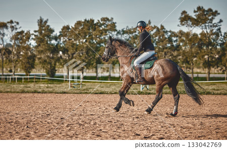 Woman, equestrian training and horse ride with mockup in nature on countryside grass field. Animal, young jockey and farm of a rider and athlete with mock up outdoor doing saddle sports with horses Woman, equestrian training and horse ride with mockup in nature on countryside grass field. Animal, young jockey and farm of a rider and athlete with mock up outdoor doing saddle sports with horses 133042769