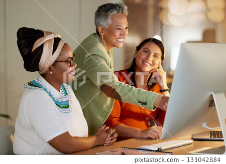 Computer, office and manager training women with research for a corporate company project at night. Management, discussion and woman leader helping female business team work on report in workplace. Computer, office and manager training women with research for a corporate company project at night. Management, discussion and woman leader helping female business team work on report in workplace. 133042884