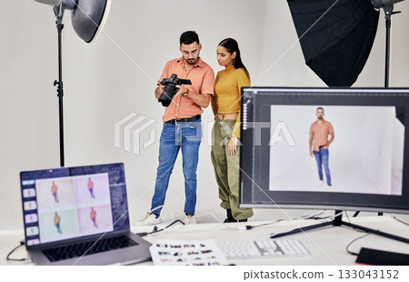 Collaboration, photographer and startup people in studio set with camera for shoot, magazine project or online content. Planning or teamwork examine picture for digital catalog or fashion web design Collaboration, photographer and startup people in studio set with camera for shoot, magazine project or online content. Planning or teamwork examine picture for digital catalog or fashion web design 133043152