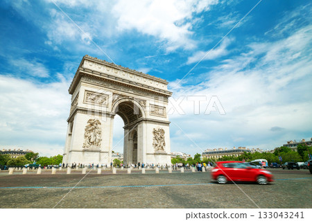 Famous Arc de Triomphe against nice blue sky Arc de Triomphe mon 133043241