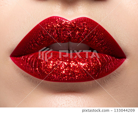 Glamour kiss. Female lips with bright red lipstick. Glamour background. Close-up. 133044209