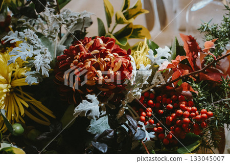 Vibrant Autumn Floral Arrangement with Autumn Leaves Vibrant Autumn Floral Arrangement with Autumn Leaves 133045007