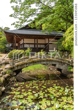 Zenno-ji Temple and stone bridge surrounded by greenery in Takayama Zenno-ji Temple and stone bridge surrounded by greenery in Takayama 133045868