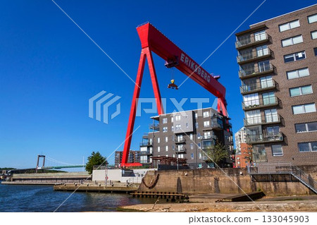 Big gantry Eriksberg district crane at former shipyard near Alvsborg bridge, Hisingen island, sunny day in Gothenburg, Sweden Big gantry Eriksberg district crane at former shipyard near Alvsborg bridge, Hisingen island, sunny day in Gothenburg, Sweden 133045903