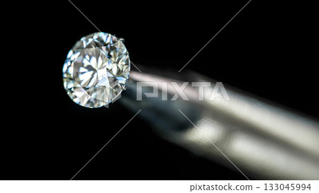 A close up of a diamond on a metal object 133045994