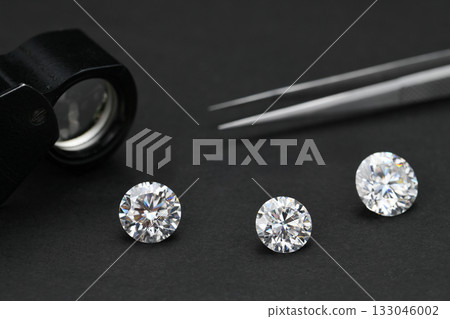 Three diamonds are displayed on a black background 133046002