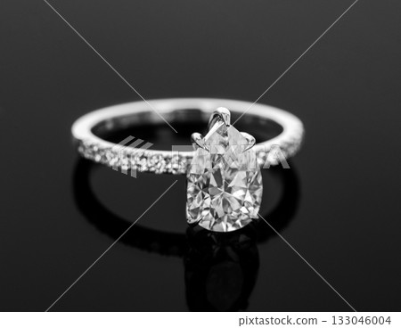 A diamond ring with a white band A diamond ring with a white band 133046004