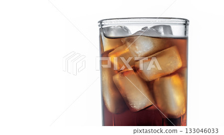 A glass of soda with ice cubes in it 133046033