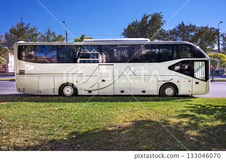 Yerevan Armenia 10.22.2025. A white bus is parked in a grassy area Yerevan Armenia 10.22.2025. A white bus is parked in a grassy area 133046070