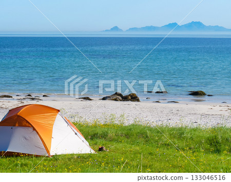 Seascape with tent on beach, Lofoten Norway 133046516