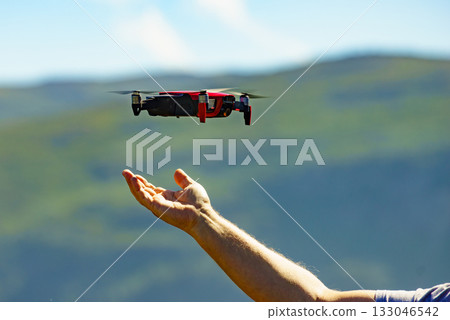 Start the drone, launching from hand Start the drone, launching from hand 133046542