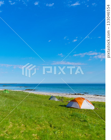 Seascape with tent on beach, Lofoten Norway Seascape with tent on beach, Lofoten Norway 133046554