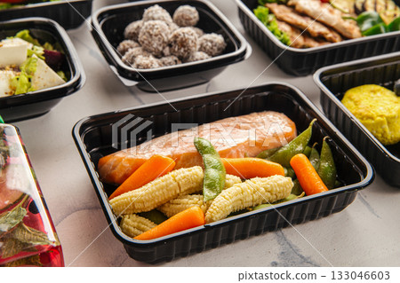 Healthy salmon meal with vegetables in box Healthy salmon meal with vegetables in box 133046603