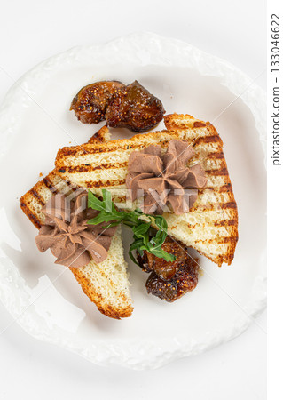 Isolated toast with liver pate and greens Isolated toast with liver pate and greens 133046622