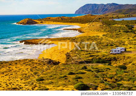 Coast view with camper rv camping on sea shore, Spain 133046737