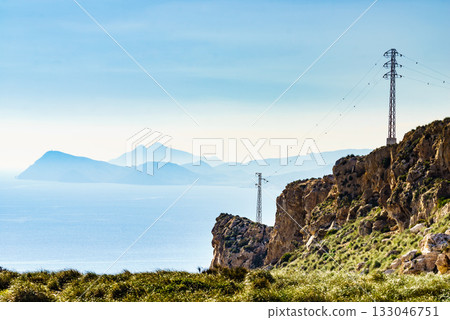High voltage towers on spanish coast High voltage towers on spanish coast 133046751