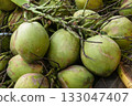 Pile of coconuts ready to be sold on market 133047407