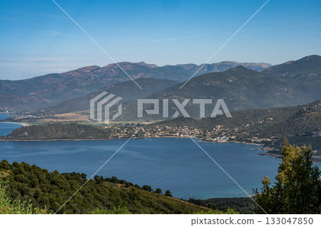 Spectacular view Golf at Sagone Corsica France beautyful sand Beach boats mountain village Tourism and vacations concept Spectacular view Golf at Sagone Corsica France beautyful sand Beach boats mountain village Tourism and vacations concept 133047850
