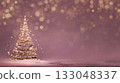 Abstract Christmas background with shimmering spiral-shaped tree outline made of golden glitter and stars on soft dusty rose backdrop, featuring large bokeh lights. Christmas card with copy space 133048337