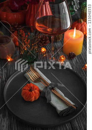 Elegant Autumn Table Setting with Pumpkins, Candles, and Festive Decor 133048553