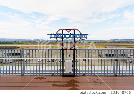 A view of the runway and a heart-shaped sign installed on the observation deck at Toyama Airport A view of the runway and a heart-shaped sign installed on the observation deck at Toyama Airport 133048766