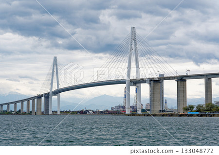 Shinminato Bridge and cloudy sky as seen from the Shinminato sightseeing boat 133048772