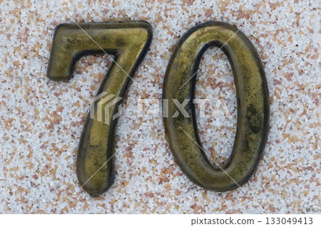 House number seventy. Yellow number seventy House number seventy. Yellow number seventy 133049413