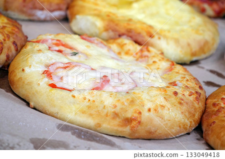 Bread products on store counter 133049418