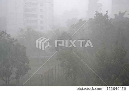 Bad weather, storm. Heavy rain and wind in city 133049456