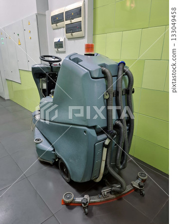 Self-propelled floor scrubber with operator seat. Ride-on floor scrubber machine Self-propelled floor scrubber with operator seat. Ride-on floor scrubber machine 133049458