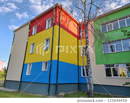 Many-coloured facade of school building 133049459