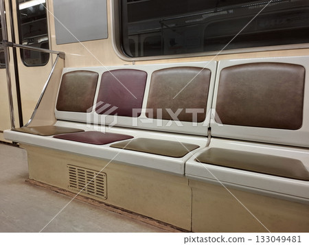 Empty seats in subway car. Seats without people Empty seats in subway car. Seats without people 133049481