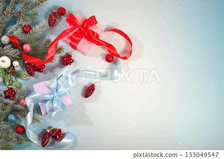 New Year's sales and shopping concept, Holiday gift boxes for a festive evening with Christmas decorations and fir branches Black Friday, advertising banner for a store and screen template 133049547