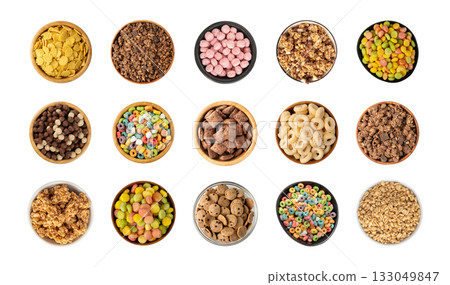 Assorted breakfast cereal piles isolated. Corn flakes mix, various granola food Assorted breakfast cereal piles isolated. Corn flakes mix, various granola food 133049847