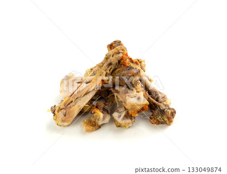 Chicken Leftovers, Unfinished Grilled Chicken on Dirty Plate Isolated, Meat Pieces and Bones after Dinner 133049874