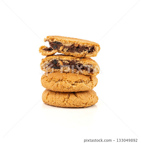 Chocolate cookies with chocolate filling isolated, brown round biscuits, broken sweet cocoa pastry Chocolate cookies with chocolate filling isolated, brown round biscuits, broken sweet cocoa pastry 133049892