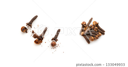 Clove spice crumbled isolated. Macro broken dry carnation spicy buds, natural Indian clove pieces 133049933