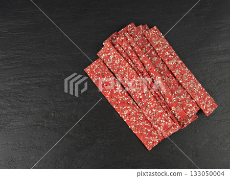 Beetroot crackers, thin rusk beet root bread, red diet multigrain crispbread, various seeds Beetroot crackers, thin rusk beet root bread, red diet multigrain crispbread, various seeds 133050004