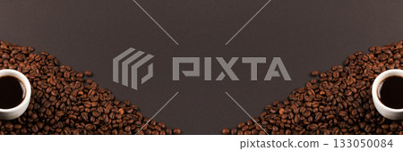 Hot coffee cup and coffee beans on black background top view 133050084